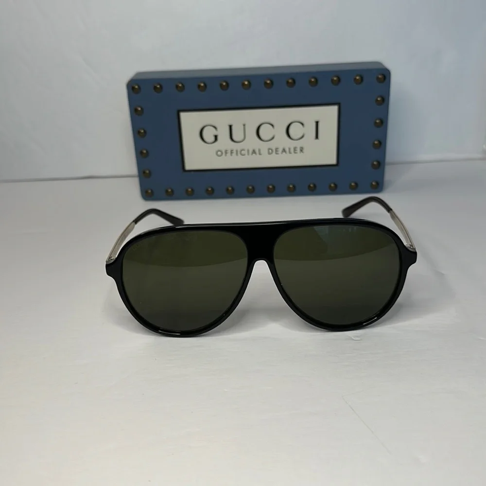 GUCCI GG0829SA 002 aviator sunglass black and ruthenium frame with green lenses.